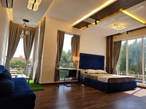 Anushthan Villa a private serviced villa for events and staycation with luxury views of garden and fountain pool in UAE